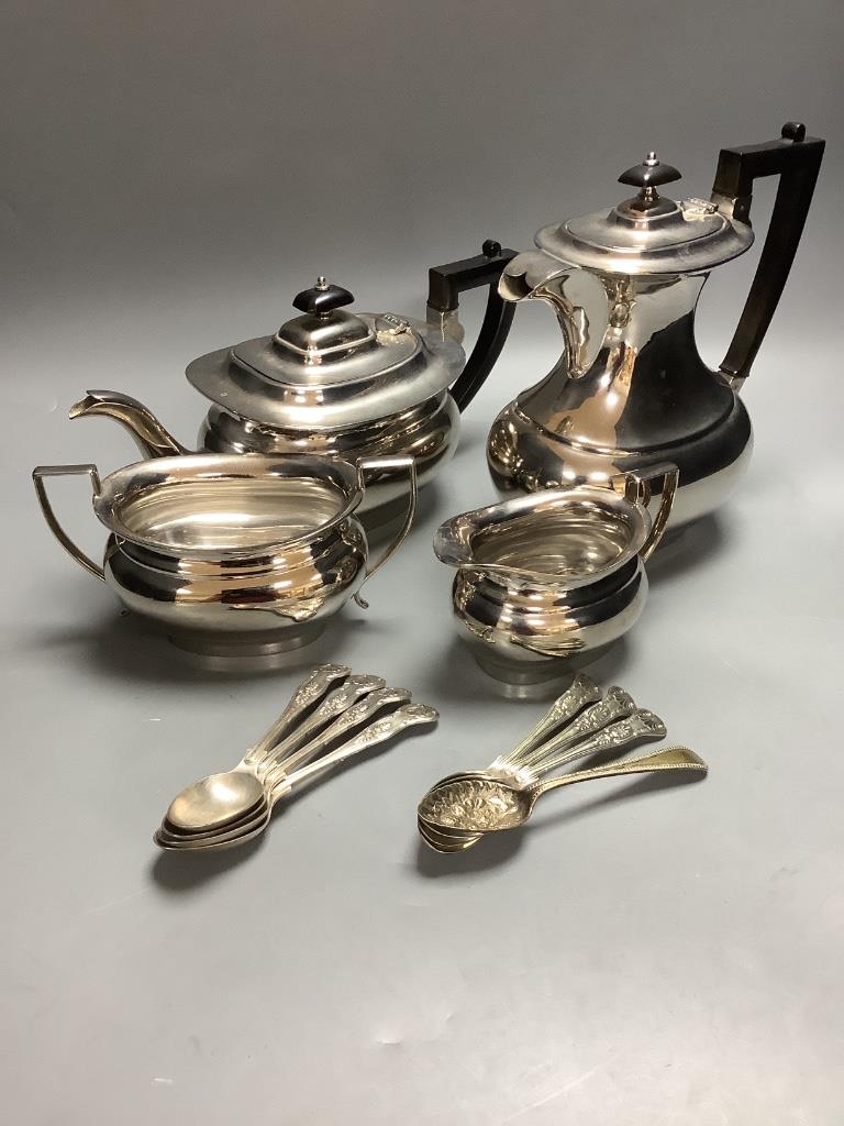 A four piece plated tea set and plated teaspoons.